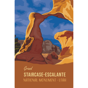 Rectangular Sign with blue Sky's and Light brown rocks and text that says "grand Staircase-Escalante national Monument Utah"