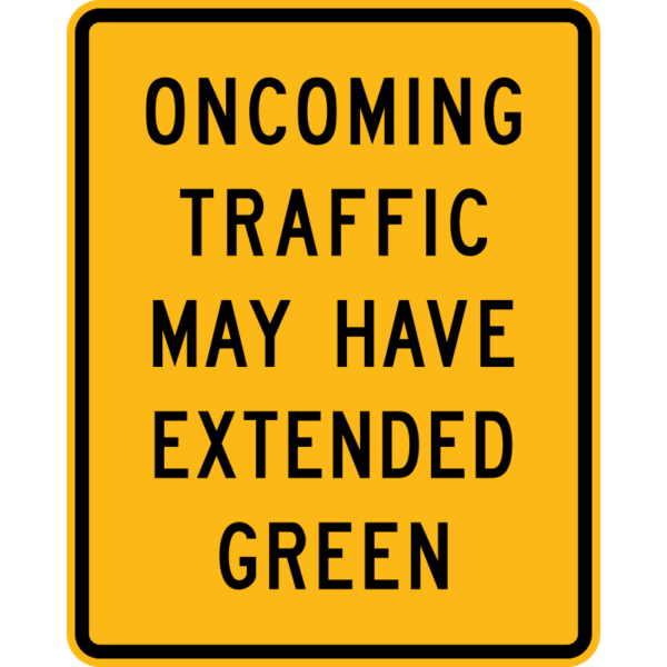 W25-2 Oncoming Traffic May Have Extended Green Sign