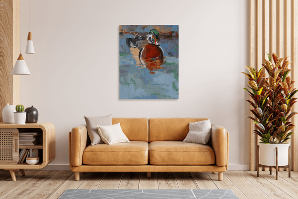 An aluminum print depicting a duck on a wall above a couch.