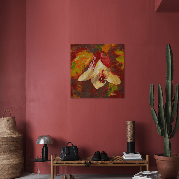 An aluminum print with a flower on it hung up on a wall.