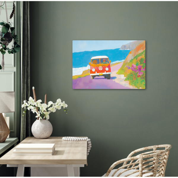 Retro Road Trip wall art on a green wall behind a desk and a vase of flowers.