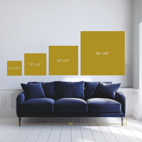 Shapes in different sizes above a couch depicting the scale of the artwork.